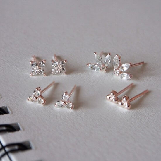 Murkani Clover Stud Earrings With White Topaz In Rose Gold Plate