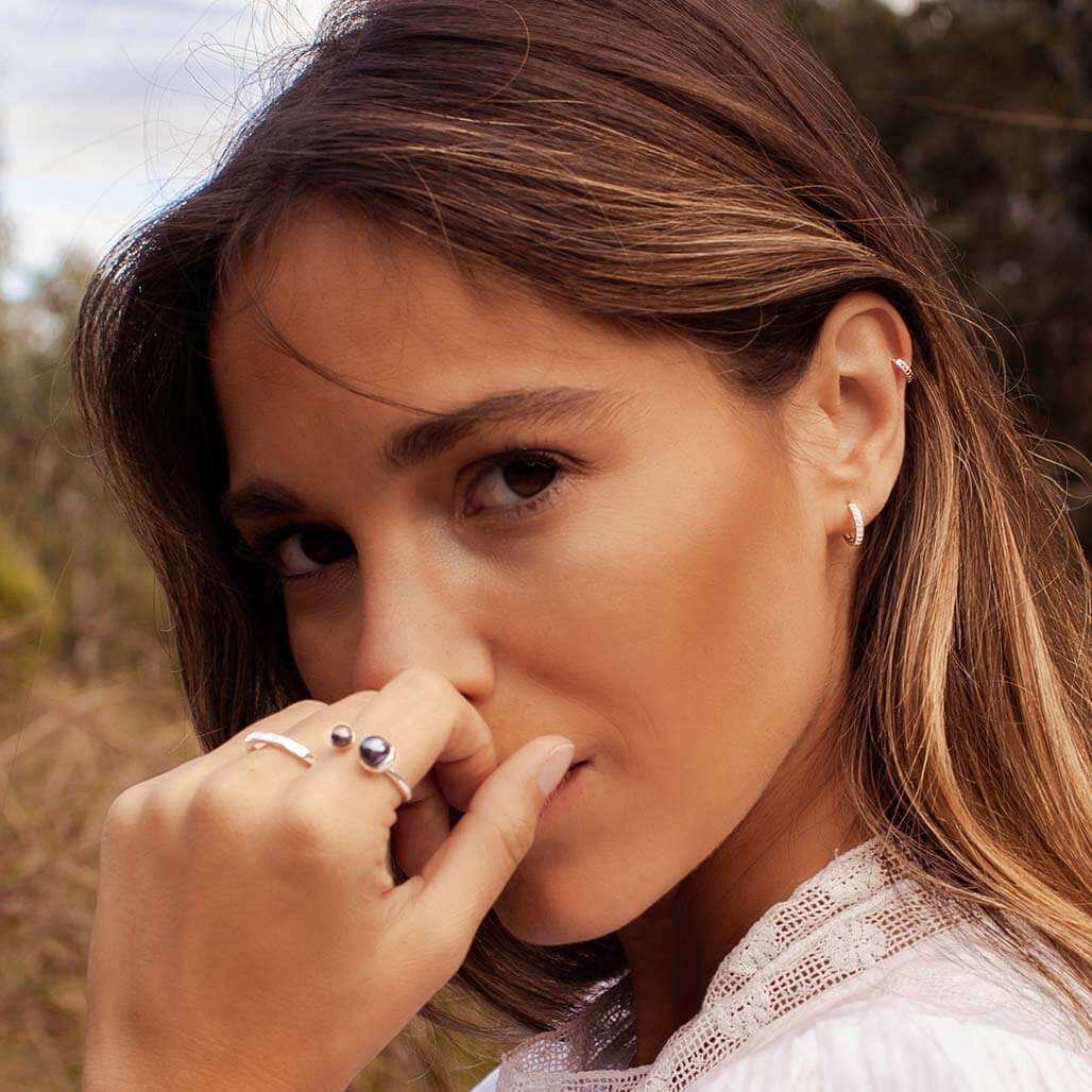 Murkani Petites 11mm Hoop Earrings With White Topaz In 18 KT Yellow Gold Plate