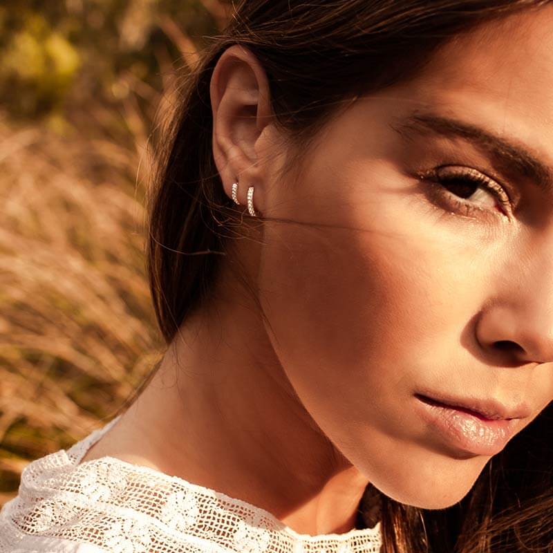 Murkani Petites 9mm Hoop Earrings With White Topaz In 18 KT Yellow Gold Plate