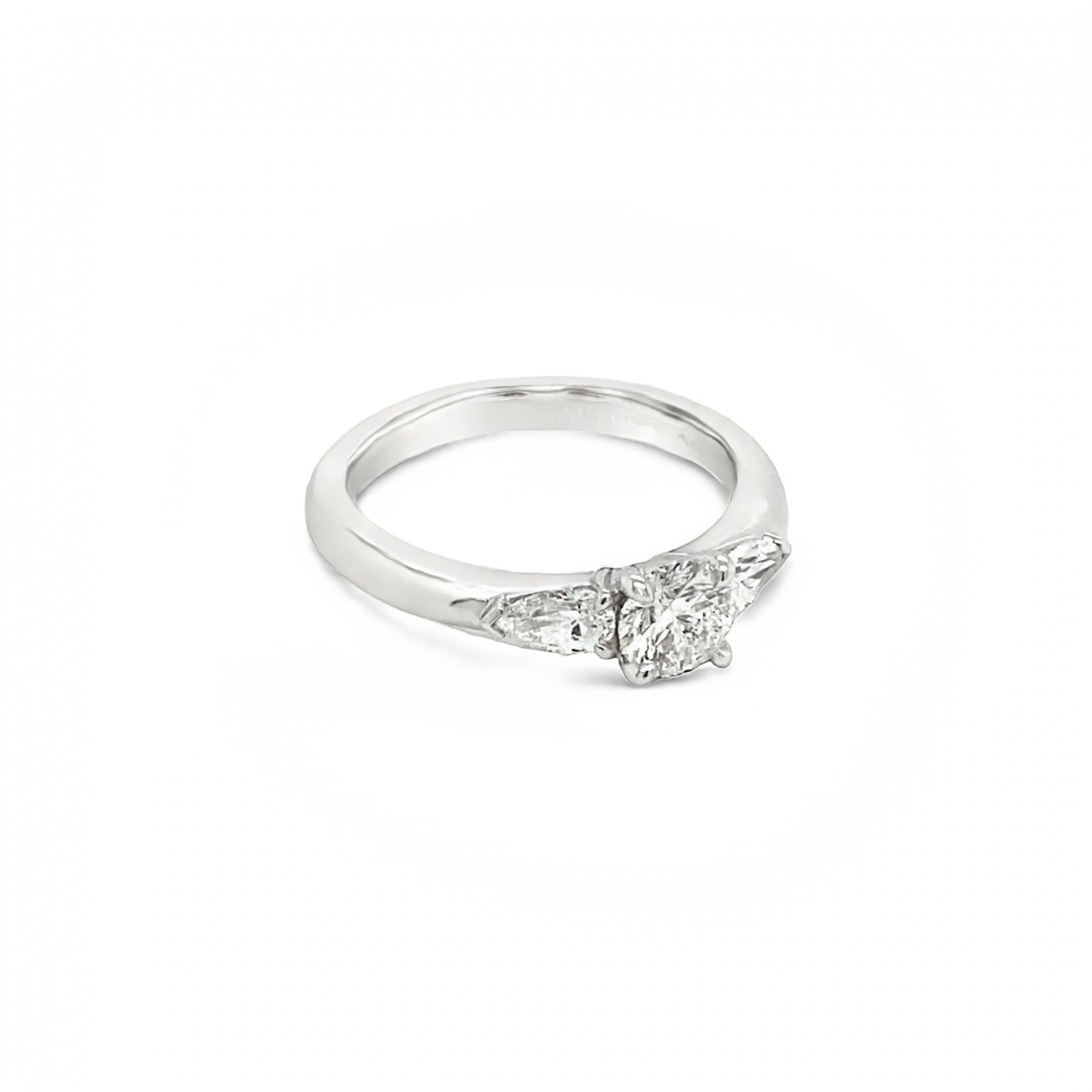 18ct White Gold Round and Pear Cut Trilogy Diamond Ring