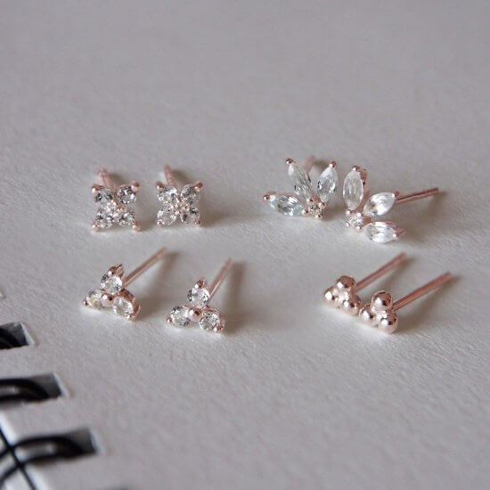 Murkani Clover Studs With White Topaz In Rose Gold Plate